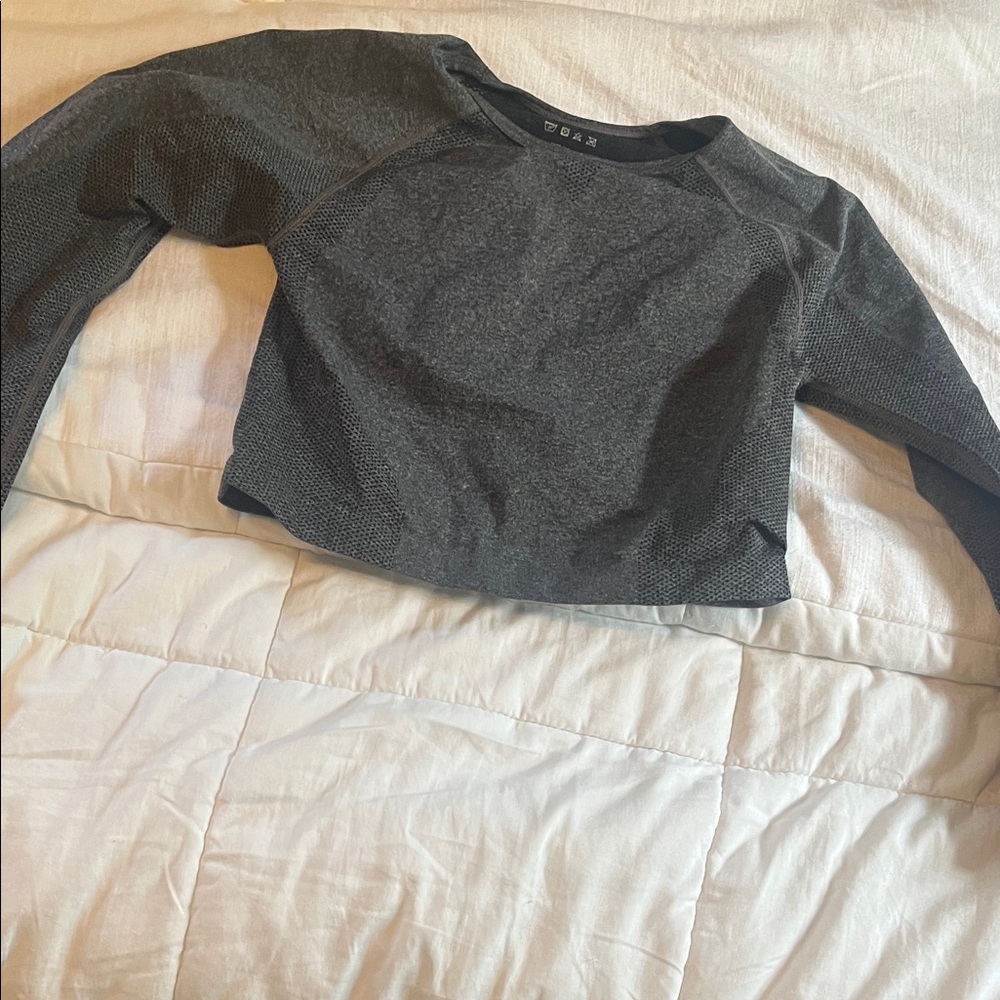 Long sleeve speckled grey gym compression top